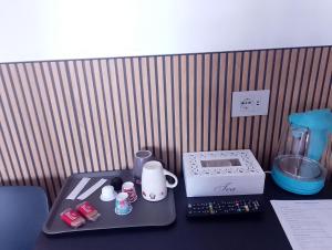 a desk with a counter top with a blender at Cabrí rooms in Vieste