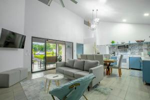 Una televisión o centro de entretenimiento en Villa María - Perfect Getaway