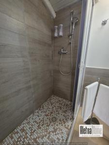 a bathroom with a shower and a toilet at ALETNA Home in Ragalna +36 photos