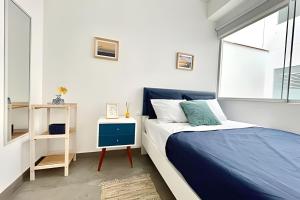 Кровать или кровати в номере Beach view apartment Punta Hermosa 4BR