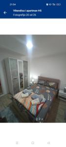 a picture of a bed in a room at Vikendica i apartman HS in Pirot