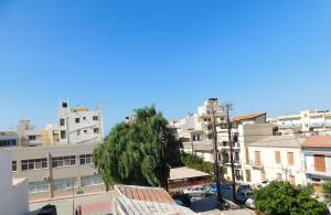a view of a city with tall buildings at Cozy Studio with Patio - Walk to City Center in Bendevís