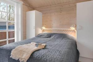 Ένα ή περισσότερα κρεβάτια σε δωμάτιο στο C11589-Hemmet-Bork-Hytteby-7 +26 φωτογραφίες