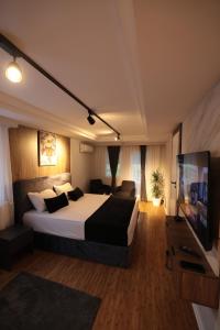 Ένα ή περισσότερα κρεβάτια σε δωμάτιο στο BEST Apartments