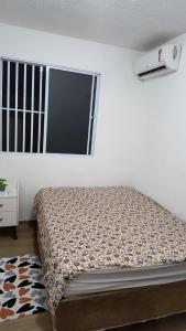 Postel nebo postele na pokoji v ubytování MELHOR De ARACAJU APARTAMENTO NOVINHO
