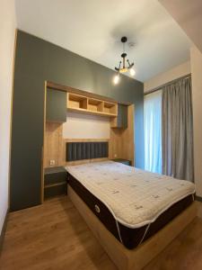 Ένα ή περισσότερα κρεβάτια σε δωμάτιο στο Hilton ApartHotel