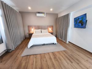 Ένα ή περισσότερα κρεβάτια σε δωμάτιο στο Florentina Living 401