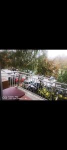 a view of a parking lot with parked cars at Apartman Dunja in Belgrade