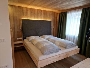 Ένα ή περισσότερα κρεβάτια σε δωμάτιο στο Apartments Angela