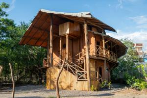 a tree house with a roof at Casa Iteri in Lo de Marcos