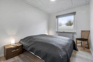 Postel nebo postele na pokoji v ubytování C11615-Skjern-Bogebakken-4