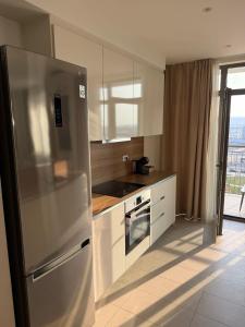 Una cocina o cocineta en The Gates 7006