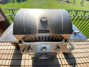 a grill sitting on top of a table at The Westview Cabin in Valemount