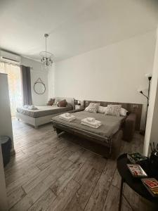 Postel nebo postele na pokoji v ubytování B&B Fiera Inn