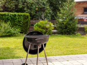 Gril dostupný pro hosty v apartmánu