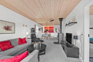 a living room with a couch and a table at C11241-Hemmet-Ildervej-22 in Hemmet