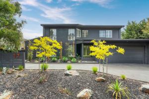 a large house with a driveway at Luxury Retreat - Spa Beach Golf Wineries in Mornington