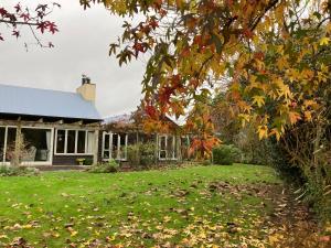 an autumn view of the front of the house at Cottonwood in Masterton