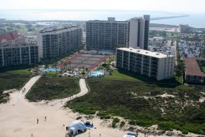 an aerial view of a beach and buildings at Saida Towers II #506 condo in South Padre Island