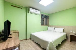 Televisyen dan/atau pusat hiburan di Motel MJ +1 gambar