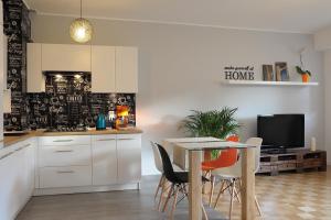 Kuchyňa alebo kuchynka v ubytovaní Apartament Kabaty