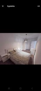 Ένα ή περισσότερα κρεβάτια σε δωμάτιο στο Zagan Apartments #3