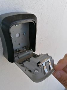 a hand is holding a metal object in a holder at American Consulate 5 minutes away D1 in Manuel F. Martínez +5 photos