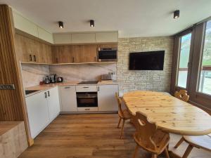 Kuchyň nebo kuchyňský kout v ubytování Tignes 2 pièces, 4 pers, WIFI, près des pistes - FR-1-502-601 + 6 fotografií