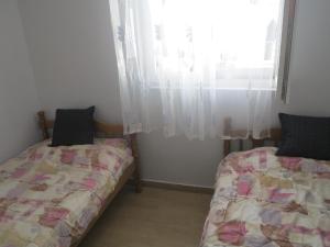 Postel nebo postele na pokoji v ubytování Apartment Tea&Lela