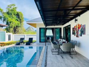 Πισίνα στο ή κοντά στο Leigh Villa