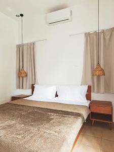 Ένα ή περισσότερα κρεβάτια σε δωμάτιο στο The Cocoon House +22 φωτογραφίες