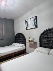 Postel nebo postele na pokoji v ubytování Hotel Ashley