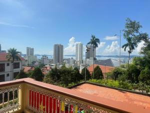 a balcony with a view of a city at Sea & Mountain by Kim in Ha Long