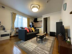 Χώρος καθιστικού στο クラージュ本郷通