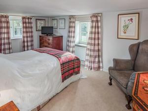 Ένα ή περισσότερα κρεβάτια σε δωμάτιο στο Green Farm Cottage