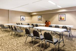 a conference room with tables and chairs in it at Comfort Suites in Humble +22 photos