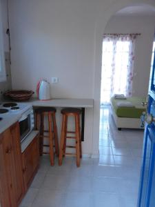 Η κουζίνα ή μικρή κουζίνα στο Aprilis Apartments