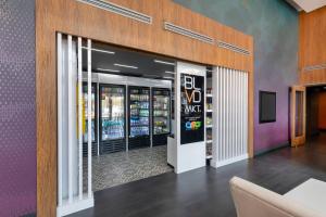 a store front with a bunch of soda machines at BLVD Hotel and Studios Universal-Hollywood, an Ascend Collection Hotel in Los Angeles