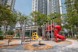 a playground in a park with slides and swings at PROMO! Large Kid-Friendly KeedzFlix, MystTunnel 5Mins to Legoland JB, Johor Malaysia in Nusajaya