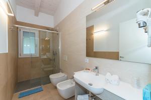 Koupelna v ubytování Park Hotel Pineta & Dependance Suite