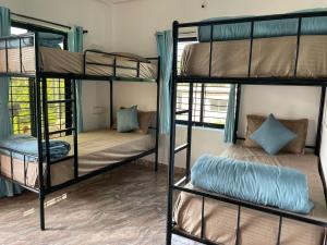 Postel nebo postele na pokoji v ubytování 12 Monks - Backpacker Resort