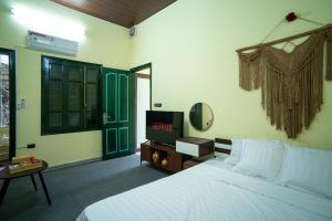 Ένα ή περισσότερα κρεβάτια σε δωμάτιο στο CozyPosy Premier Apartment +149 φωτογραφίες