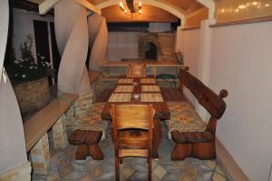a room with a table and chairs in a room at Raduga 514 in Zatoka