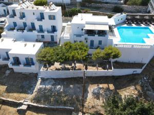 an aerial view of a villa with a swimming pool at Golden Sun in Ios Chora