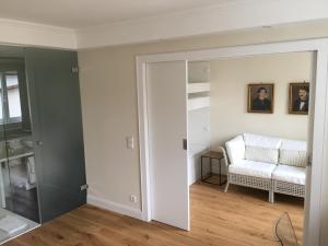 Postel nebo postele na pokoji v ubytování Boutique Hotel am Rathaus - Reblaus