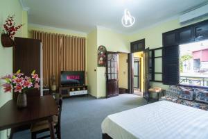 Μια τηλεόραση ή/και κέντρο ψυχαγωγίας στο CozyPosy Premier Apartment