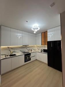 Η κουζίνα ή μικρή κουζίνα στο Cosy 2 bedroom apartment
