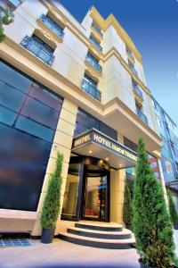 a hotel building with stairs in front of it at İstanbul Trend Hotel Old City in Istanbul