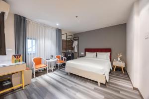 Ένα ή περισσότερα κρεβάτια σε δωμάτιο στο A25 Hotel - 55 Lê Anh Xuân