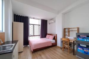 เตียงในห้องที่ Lunaria Maison - Tan Dinh Corner